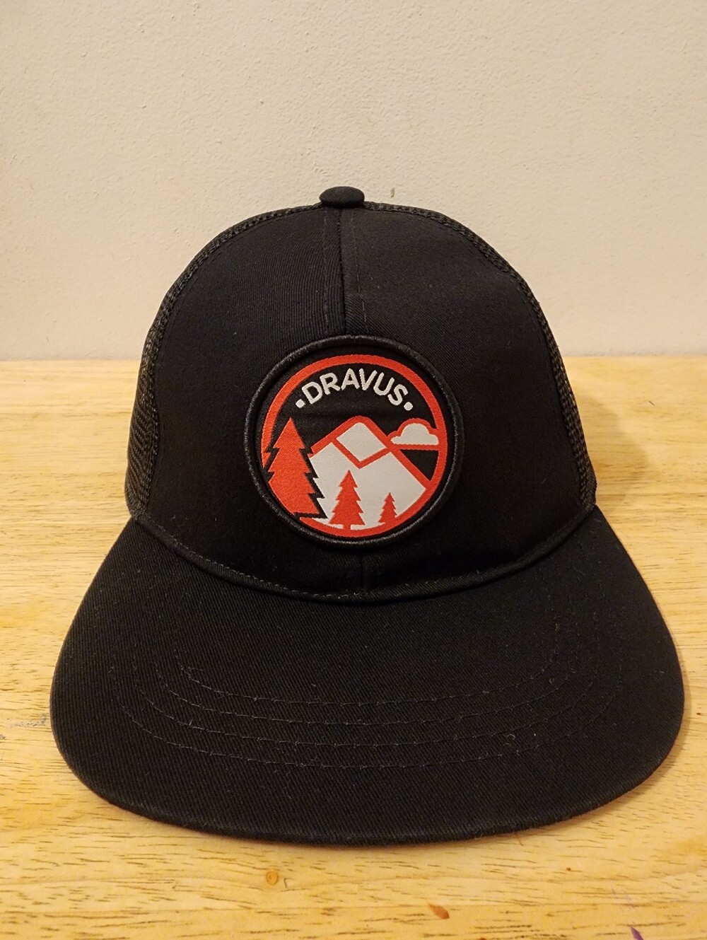 Dravus Black Trucker Hat with Red & White Mountain Patch